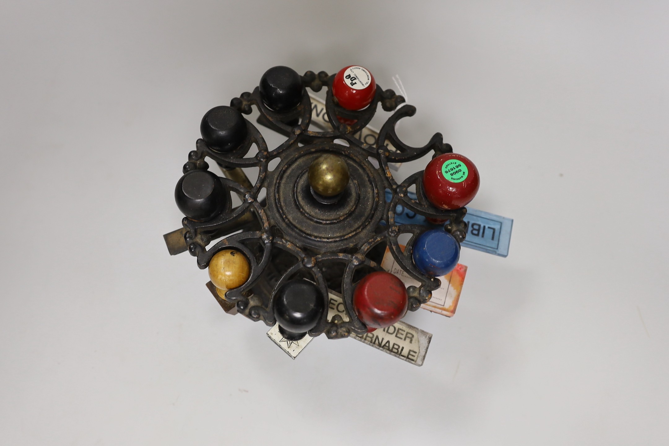 A cast iron stamp dispenser